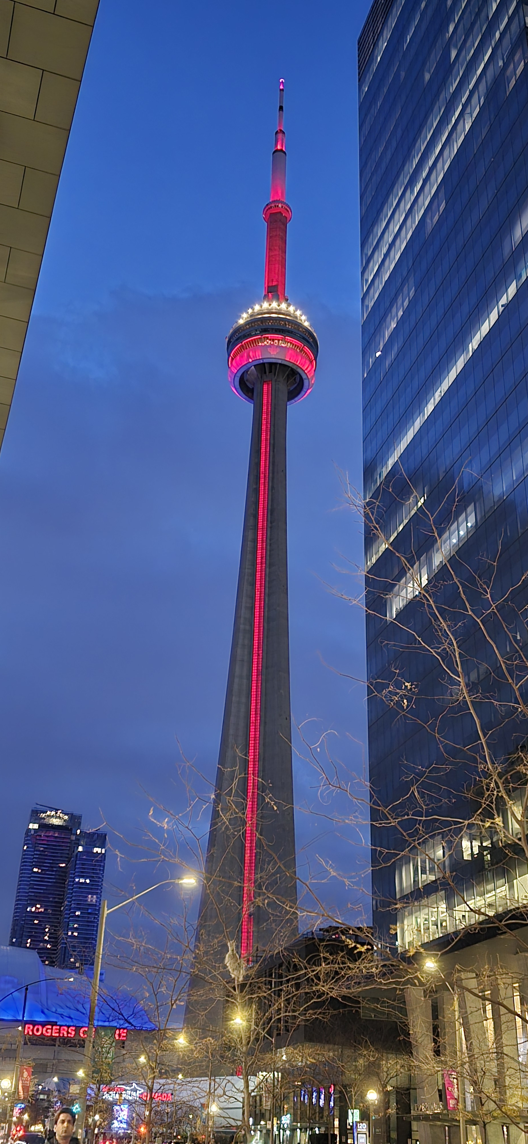 CN Tower lit up in red on November 22, 2025
