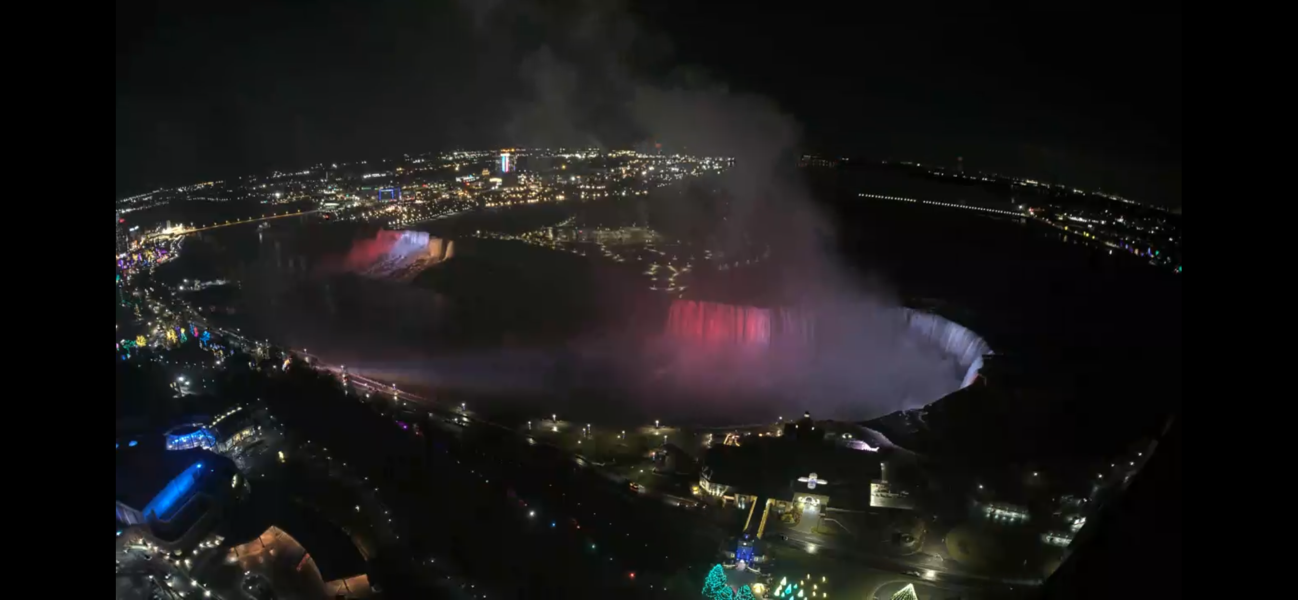 Niagara Falls lit up in red on November 22, 2025